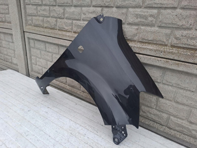 DAIHATSU SIRION SUBARU JUSTY BŁOTNIK PRAWY PRZEDNI - (17155126558)