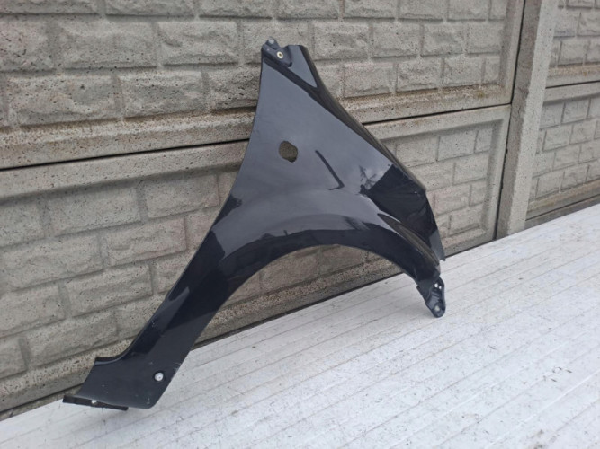 DAIHATSU SIRION SUBARU JUSTY BŁOTNIK PRAWY PRZEDNI - (17155126558)