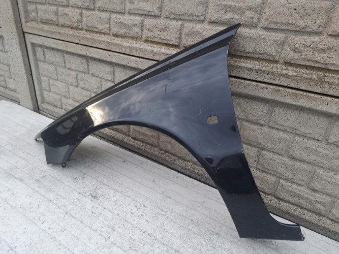 VOLVO V40 LIFT 00-04 BŁOTNIK PRZEDNI LEWY - (17196240293)