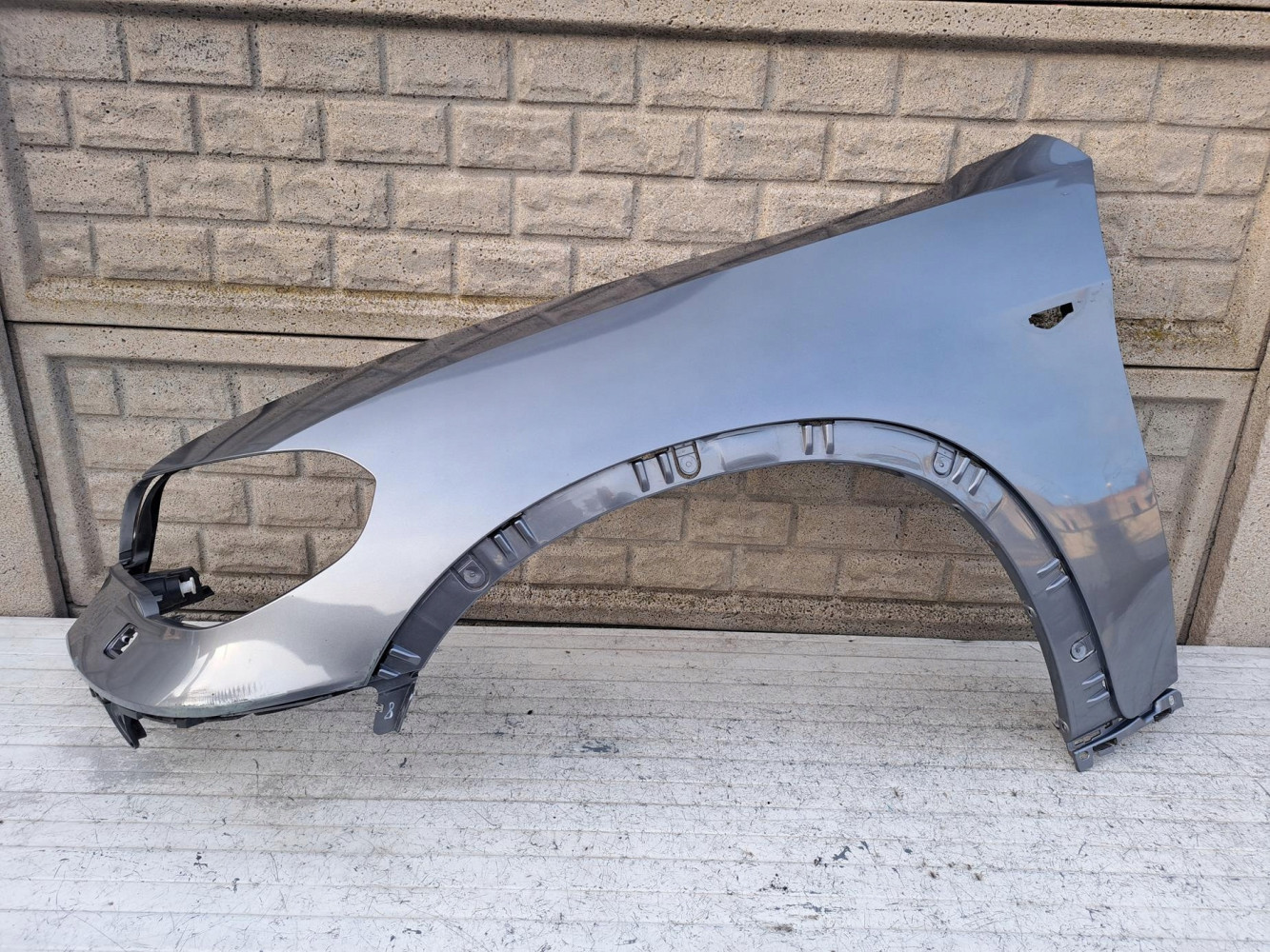 BMW X5 E70 LIFT 2010- BŁOTNIK PRZEDNI LEWY - (17207727454)