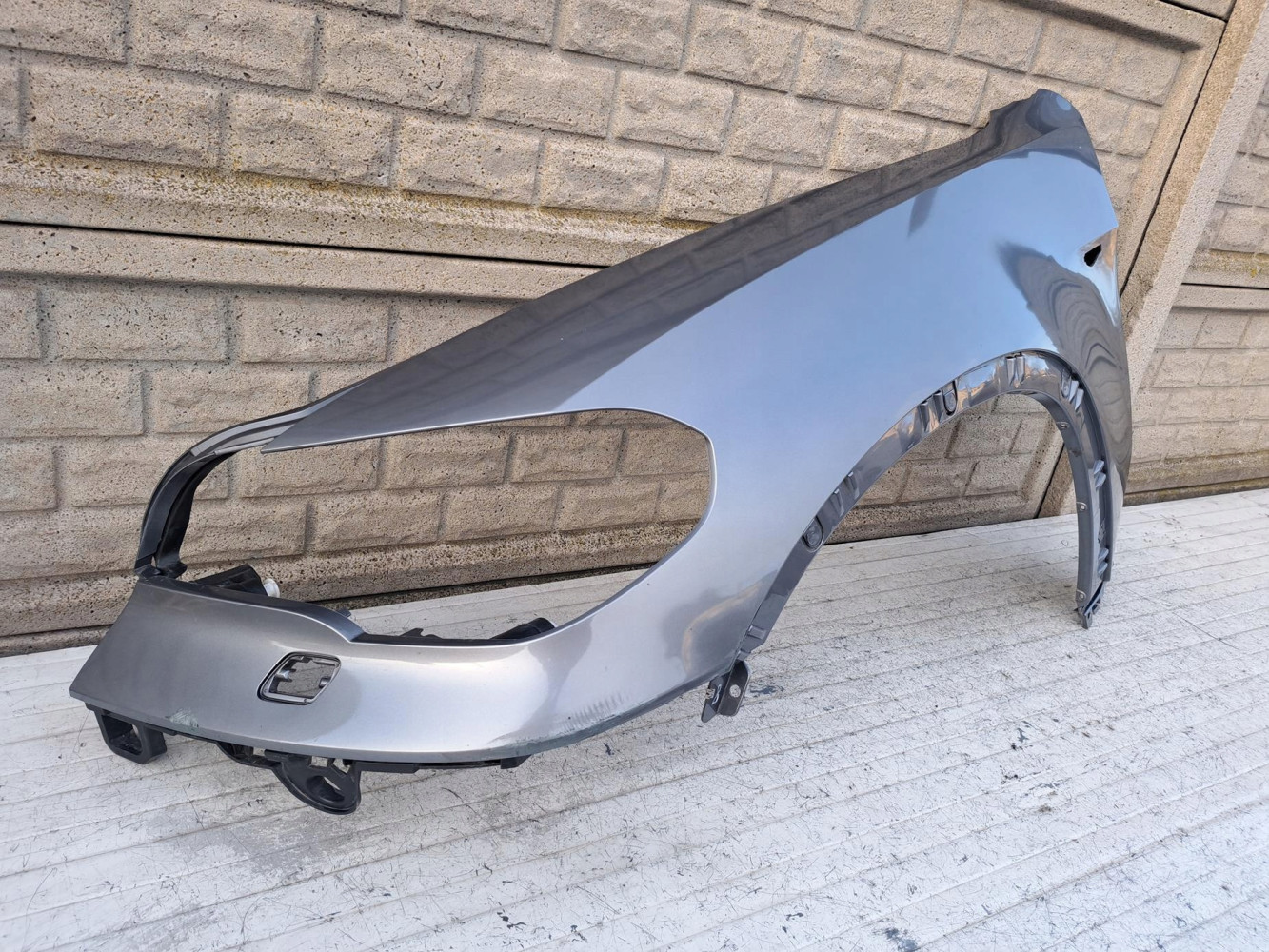 BMW X5 E70 LIFT 2010- BŁOTNIK PRZEDNI LEWY - (17207727454)
