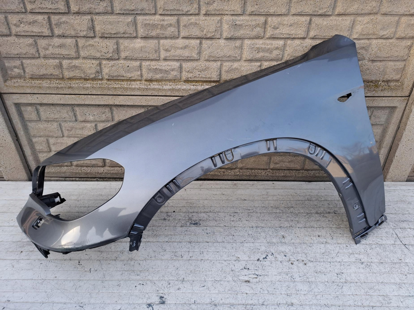 BMW X5 E70 LIFT 2010- BŁOTNIK PRZEDNI LEWY - (17207727454)