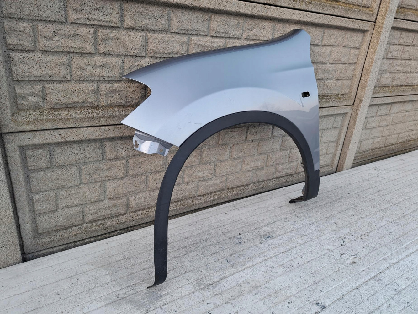 BŁOTNIK PRZEDNI LEWY NISSAN QASHQAI 10-14 LIFT - (17207734121)