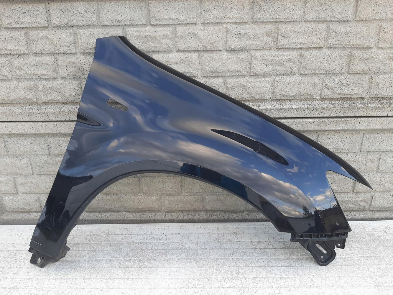MITSUBISHI ASX 10-15 BŁOTNIK PRAWY PRZEDNI - (12212648998)