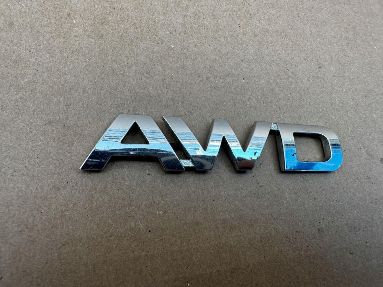 KIA SPORTAGE AWD EMBLEMAT ZNACZEK ORYGINAŁ - (17319825445)