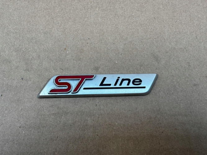 FORD ST LINE ST-LINE SREBNY EMBLEMAT ZNACZEK ORYGINAŁ - (17319945873)