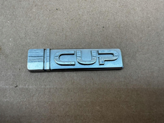 VW UP VOLKSWAGEN ZNACZEK ORYGINAŁ - (17323164454)