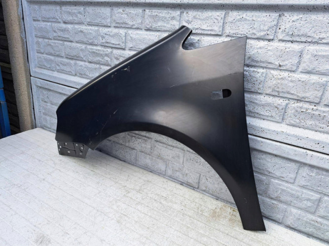 VW CADDY 2003-2010 BŁOTNIK PRZEDNI LEWY NOWY - (17331191625)