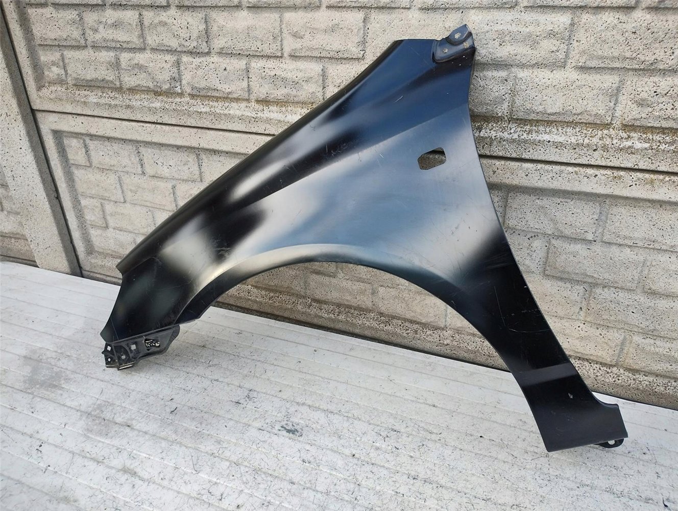 TOYOTA COROLLA E12 SEDAN KOMBI 02-09 BŁOTNIK LEWY ORYGINAŁ (17132929116)