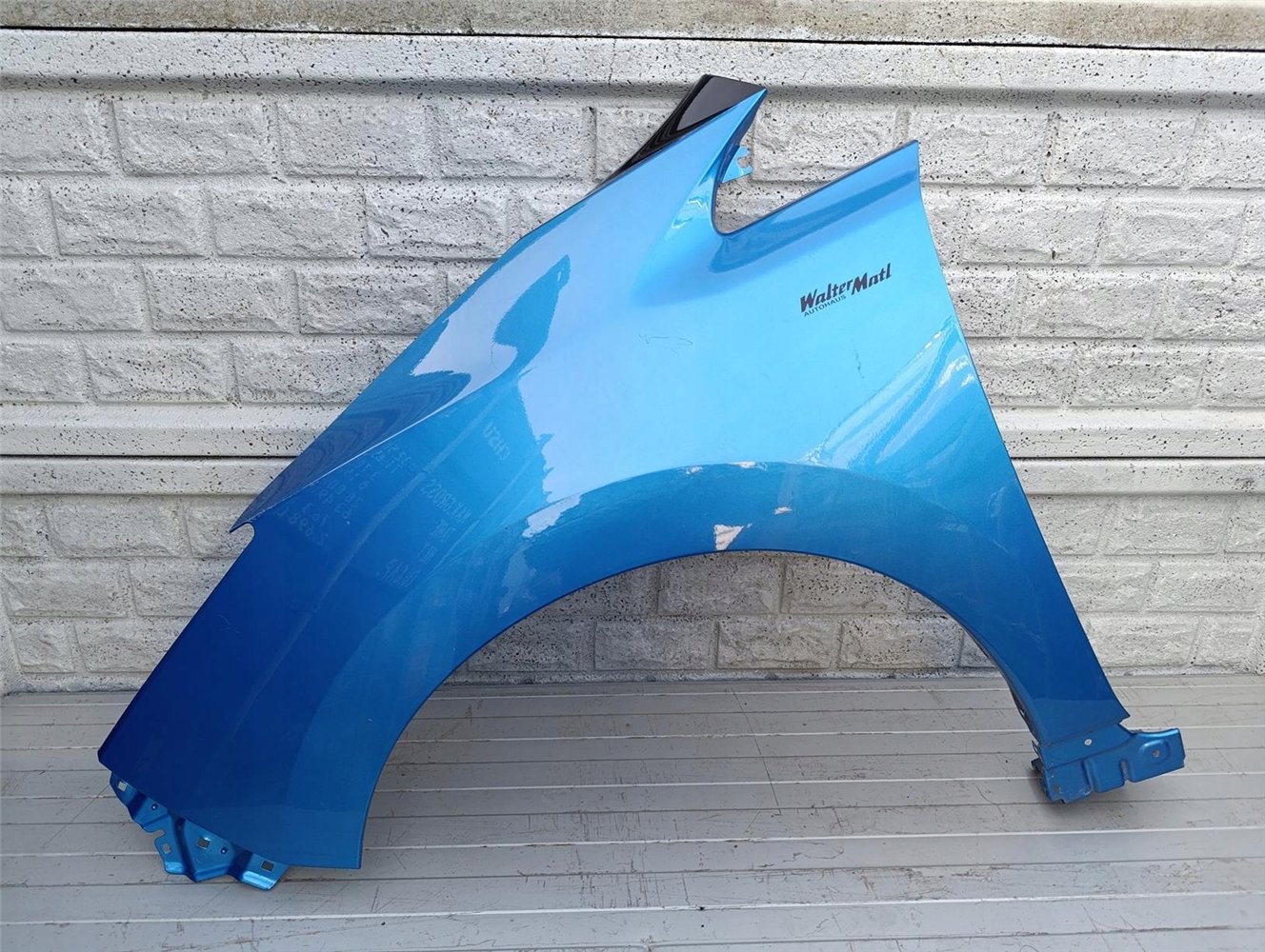 NISSAN LEAF II 17-23 BŁOTNIK PRZEDNI LEWY ORYGINAŁ (17350903260)