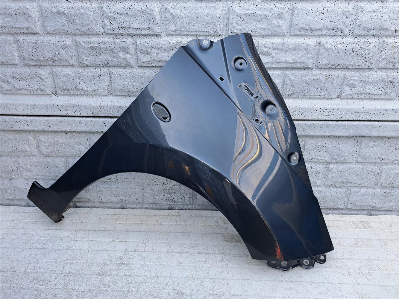 TOYOTA AYGO 2 2014-2022 BŁOTNIK PRAWY PRZEDNI ORYGINAŁ (17357025401)