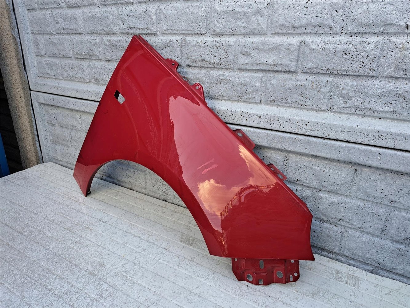 OPEL ADAM BŁOTNIK PRZEDNI PRAWY ORYGINAŁ (17357046381)