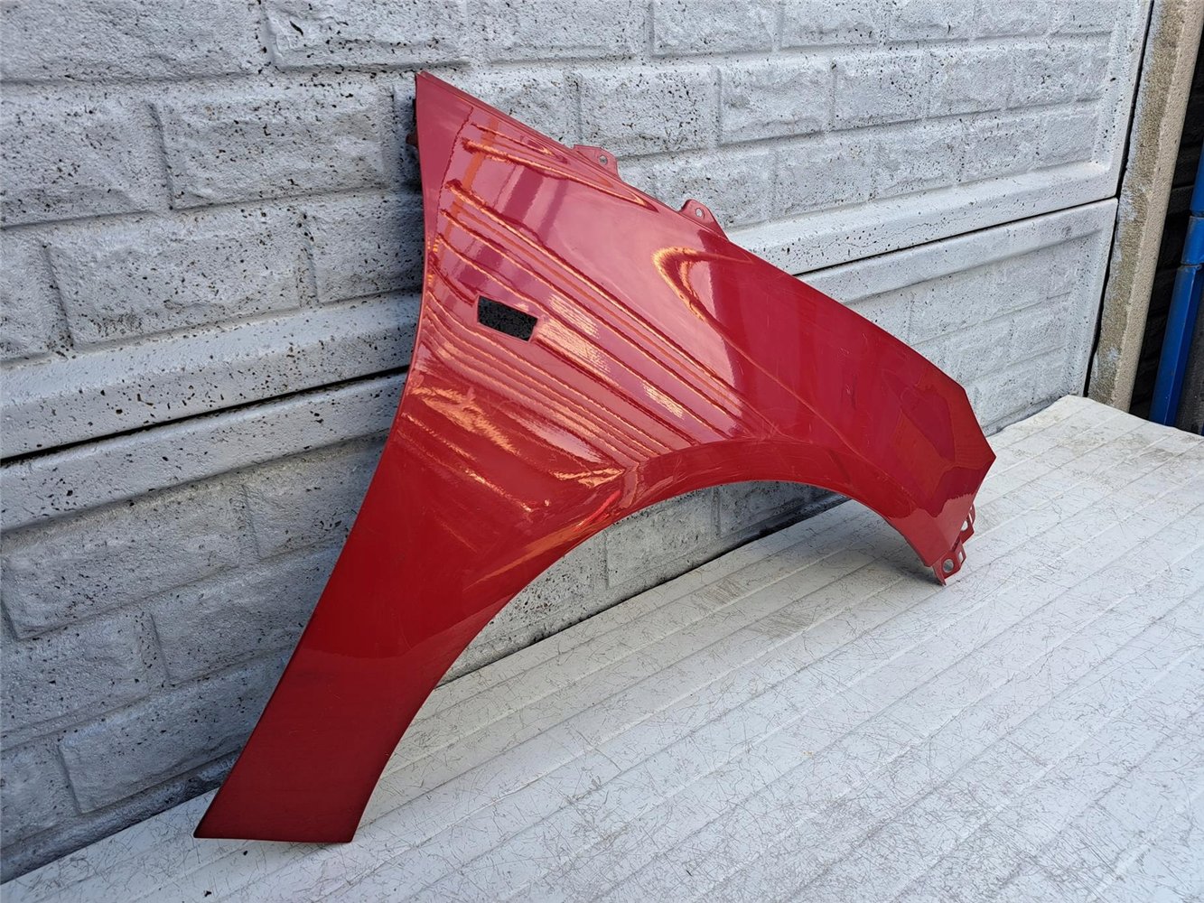 OPEL ADAM BŁOTNIK PRZEDNI PRAWY ORYGINAŁ (17357046381)