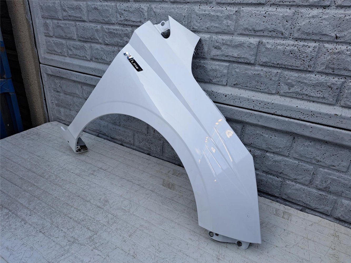 HYUNDAI I20 21-24 BŁOTNIK PRZEDNI PRAWY ORYGINAŁ (17357063614)