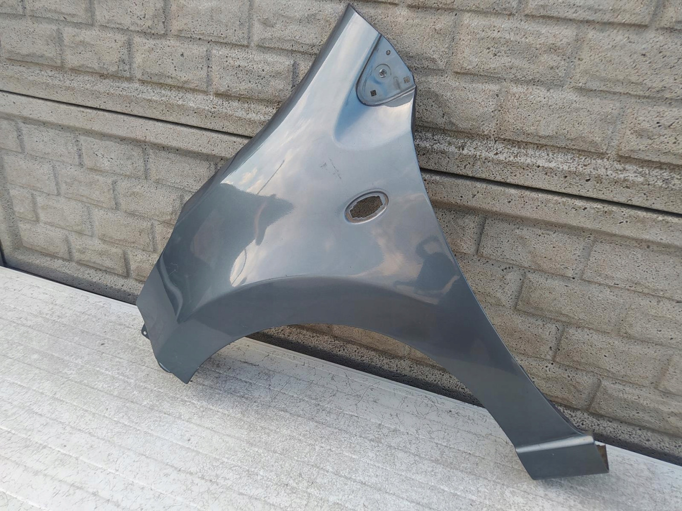 NISSAN PIXO SUZUKI ALTO BŁOTNIK LEWY PRZEDNI - (12223836517)