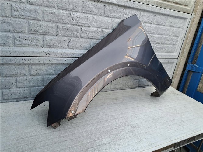 MITSUBISHI PAJERO 06 - 17 BŁOTNIK PRZEDNI LEWY ORYGINAŁ (17357154400)