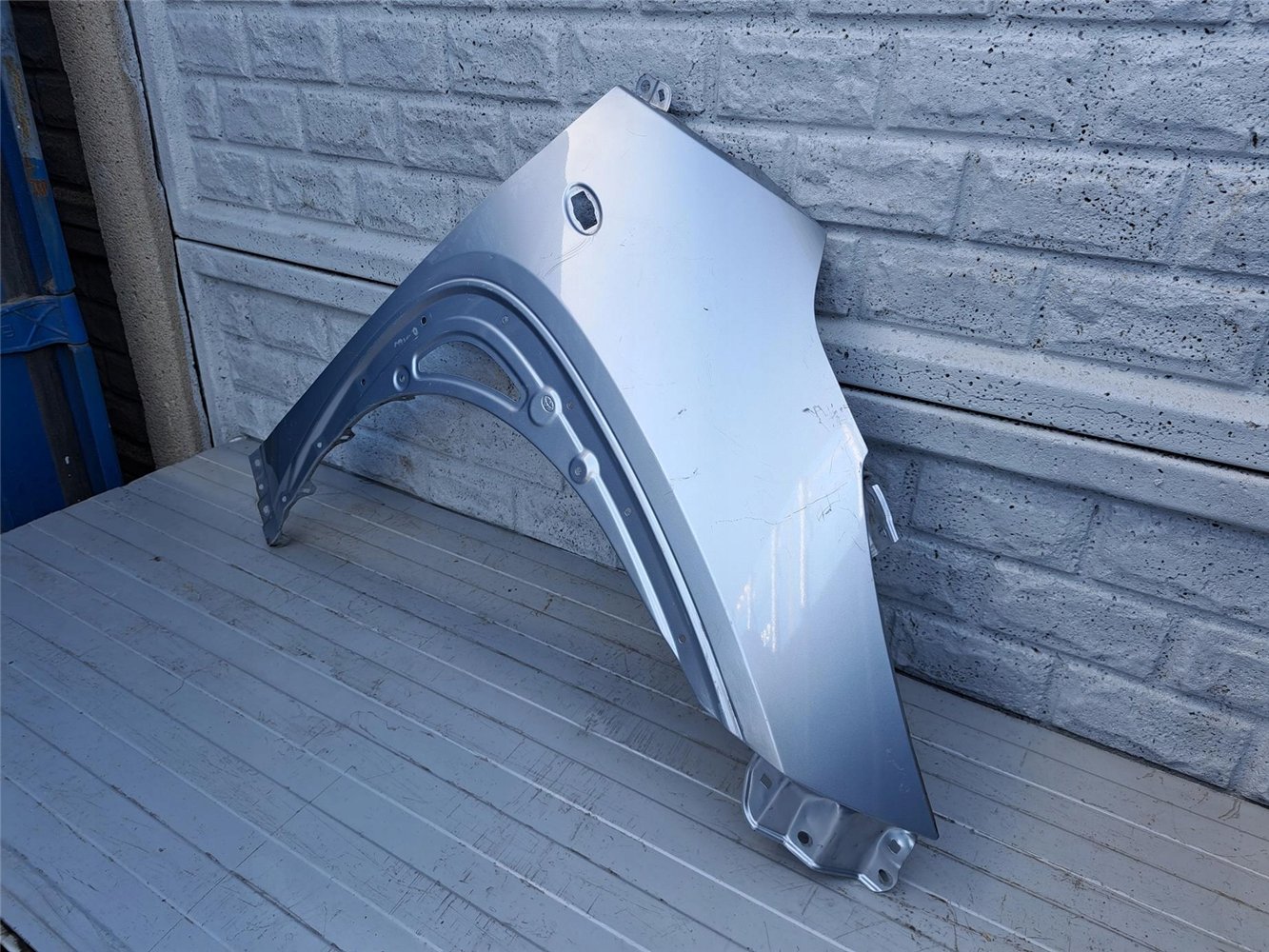 BŁOTNIK PRAWY PRZEDNI TOYOTA AYGO X 22-24 ORYGINAŁ (17357249837)