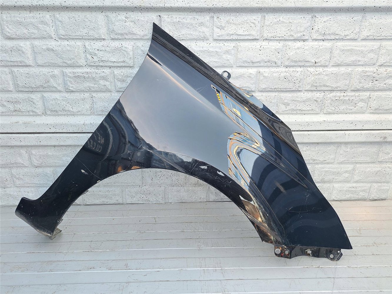 KIA CARENS BŁOTNIK PRAWY PRZEDNI ORYGINAŁ (17357256866)