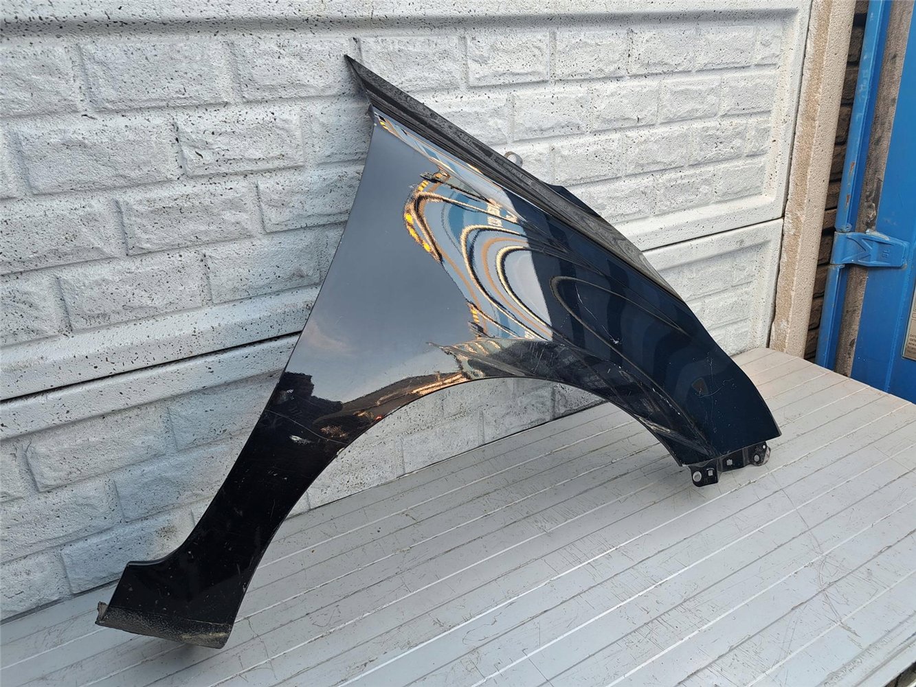 KIA CARENS BŁOTNIK PRAWY PRZEDNI ORYGINAŁ (17357256866)