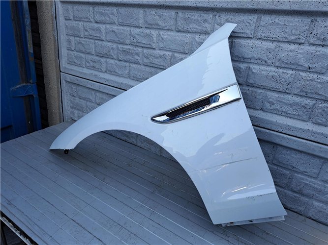 JAGUAR XF BŁOTNIK PRZÓD LEWY ORYGINAŁ (17357354172)