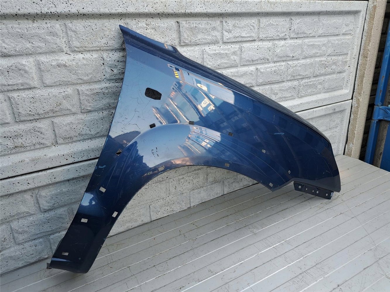 HYUNDAI TUCSON 04-09 BŁOTNIK PRAWY PRZÓD ORYGINAŁ (17357392432)