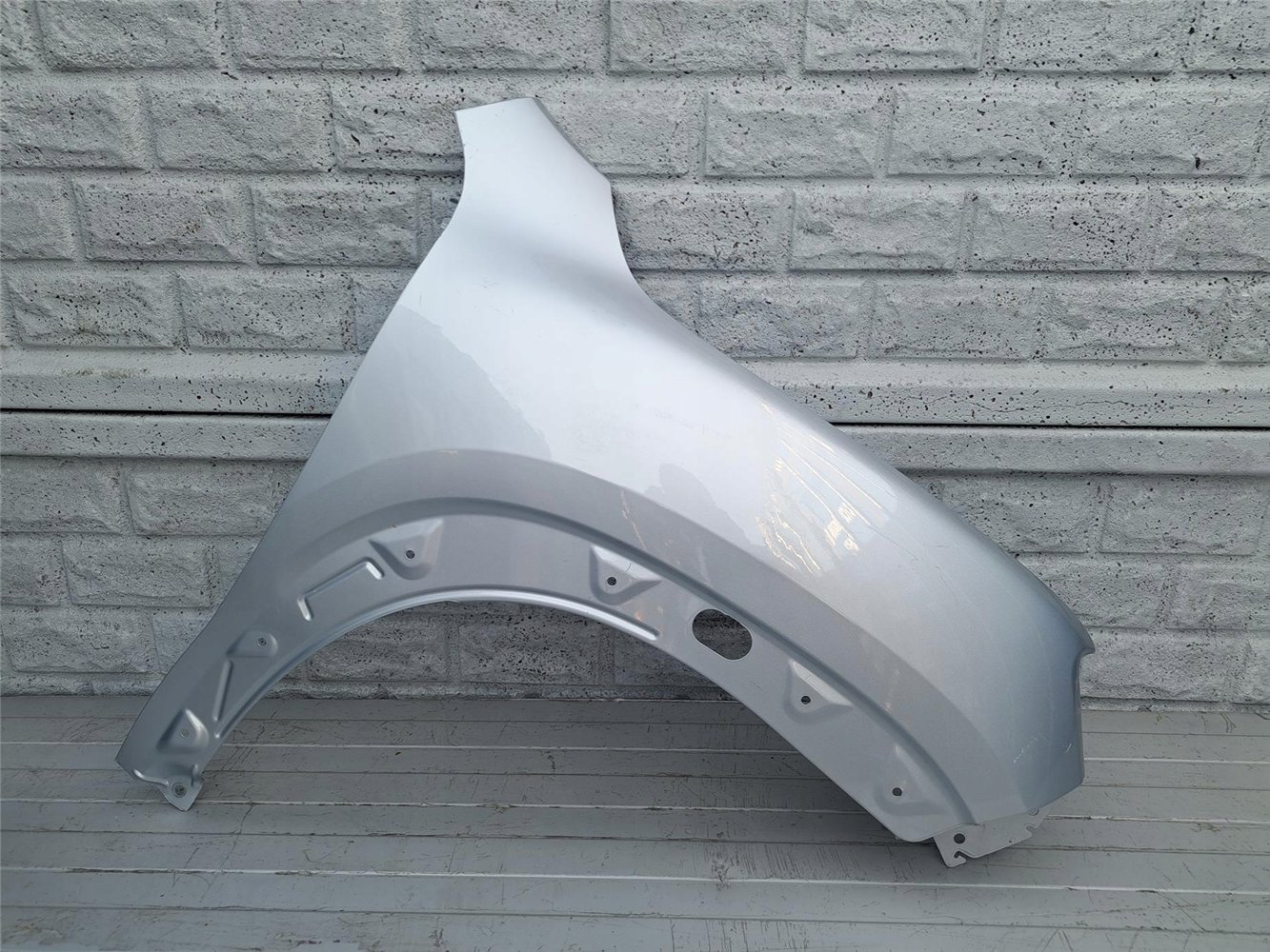 DACIA SPRING 2021- BŁOTNIK PRZEDNI PRAWY ORYGINAŁ (17357412048)