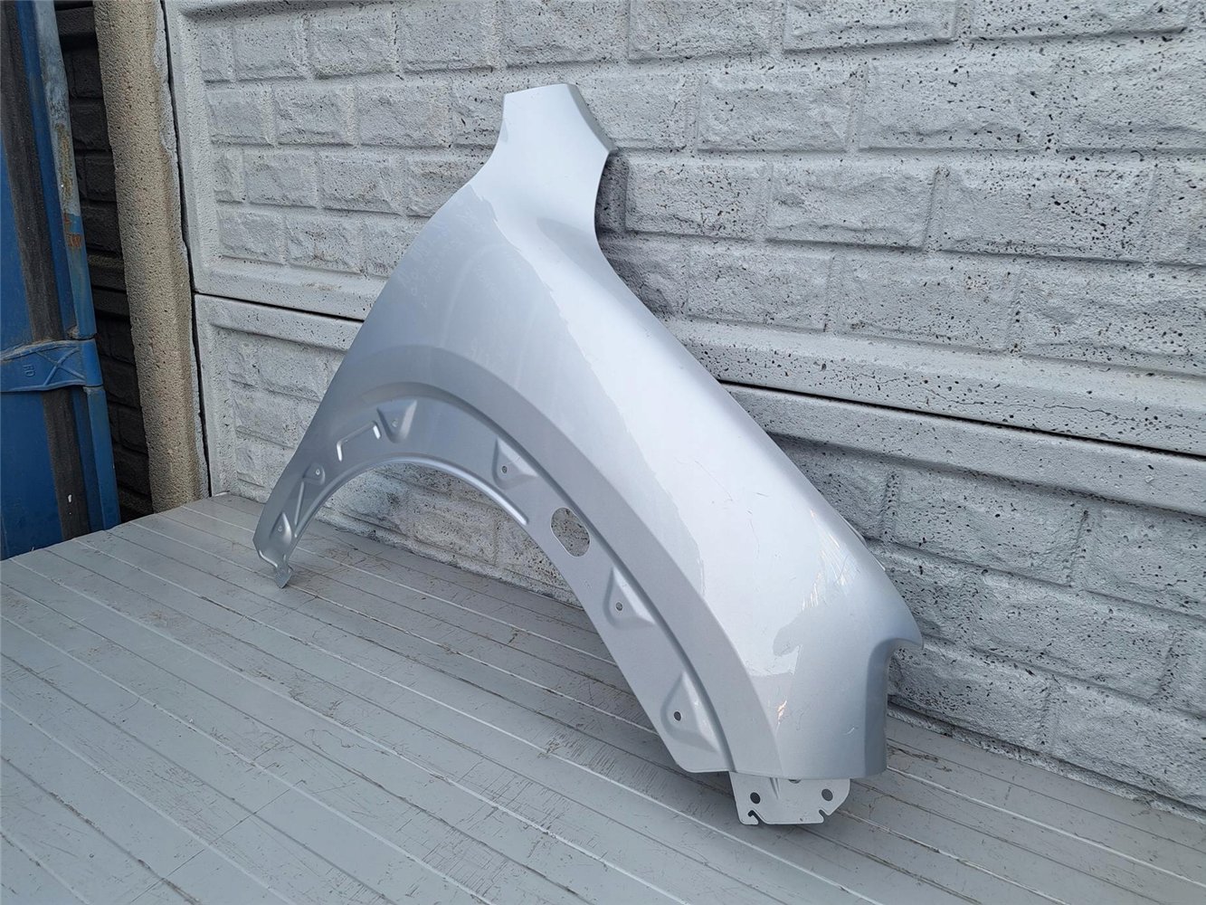 DACIA SPRING 2021- BŁOTNIK PRZEDNI PRAWY ORYGINAŁ (17357412048)