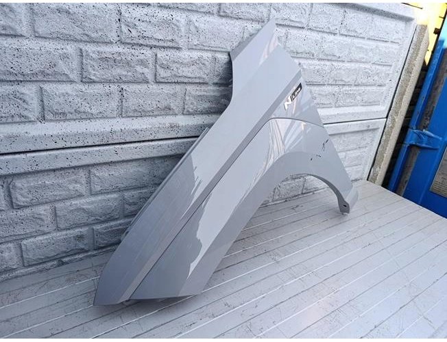 HYUNDAI KONA 2 II 2022 - 2024 BŁOTNIK LEWY PRZEDNI ORYGINAŁ (17361303668)