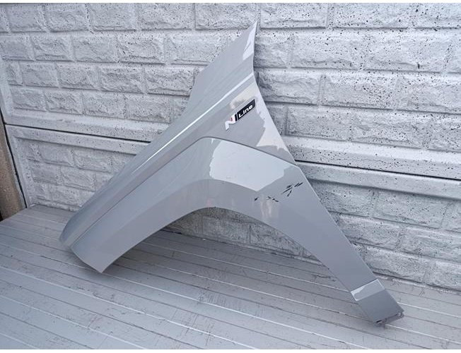 HYUNDAI KONA 2 II 2022 - 2024 BŁOTNIK LEWY PRZEDNI ORYGINAŁ (17361303668)