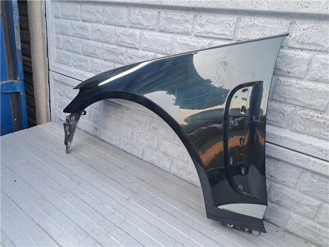 JAGUAR XF 07-12 BŁOTNIK LEWY PRZEDNI ORYGINAŁ (17366458482)