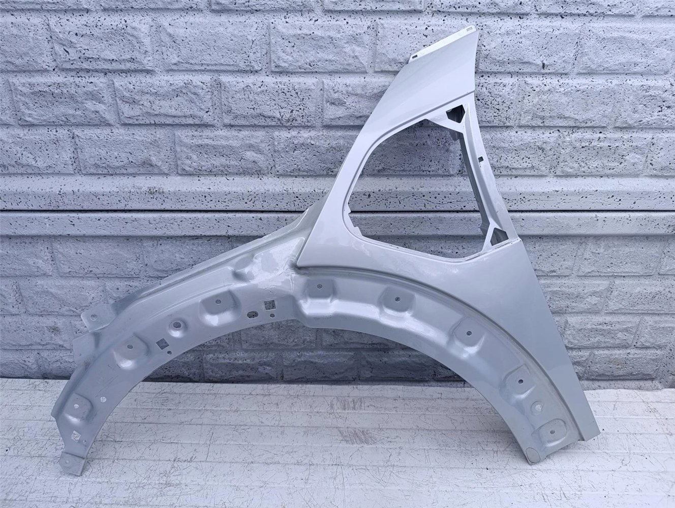 MINI COOPER COUNTRYMAN F60 SE BŁOTNIK LEWY ORYGINAŁ (17381979441)