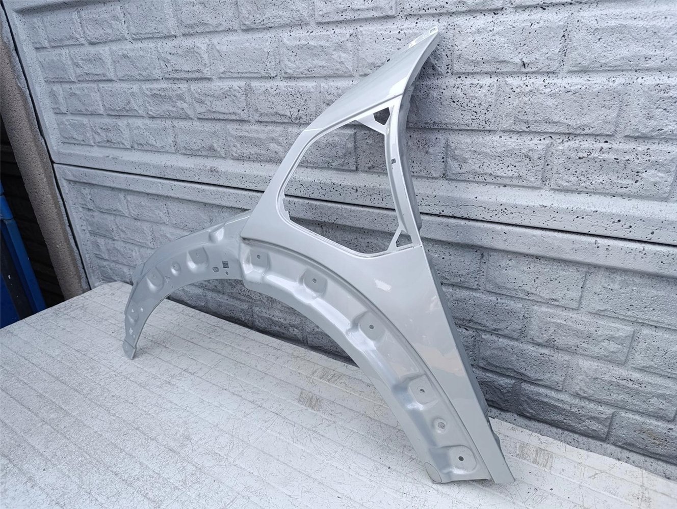 MINI COOPER COUNTRYMAN F60 SE BŁOTNIK LEWY ORYGINAŁ (17381979441)