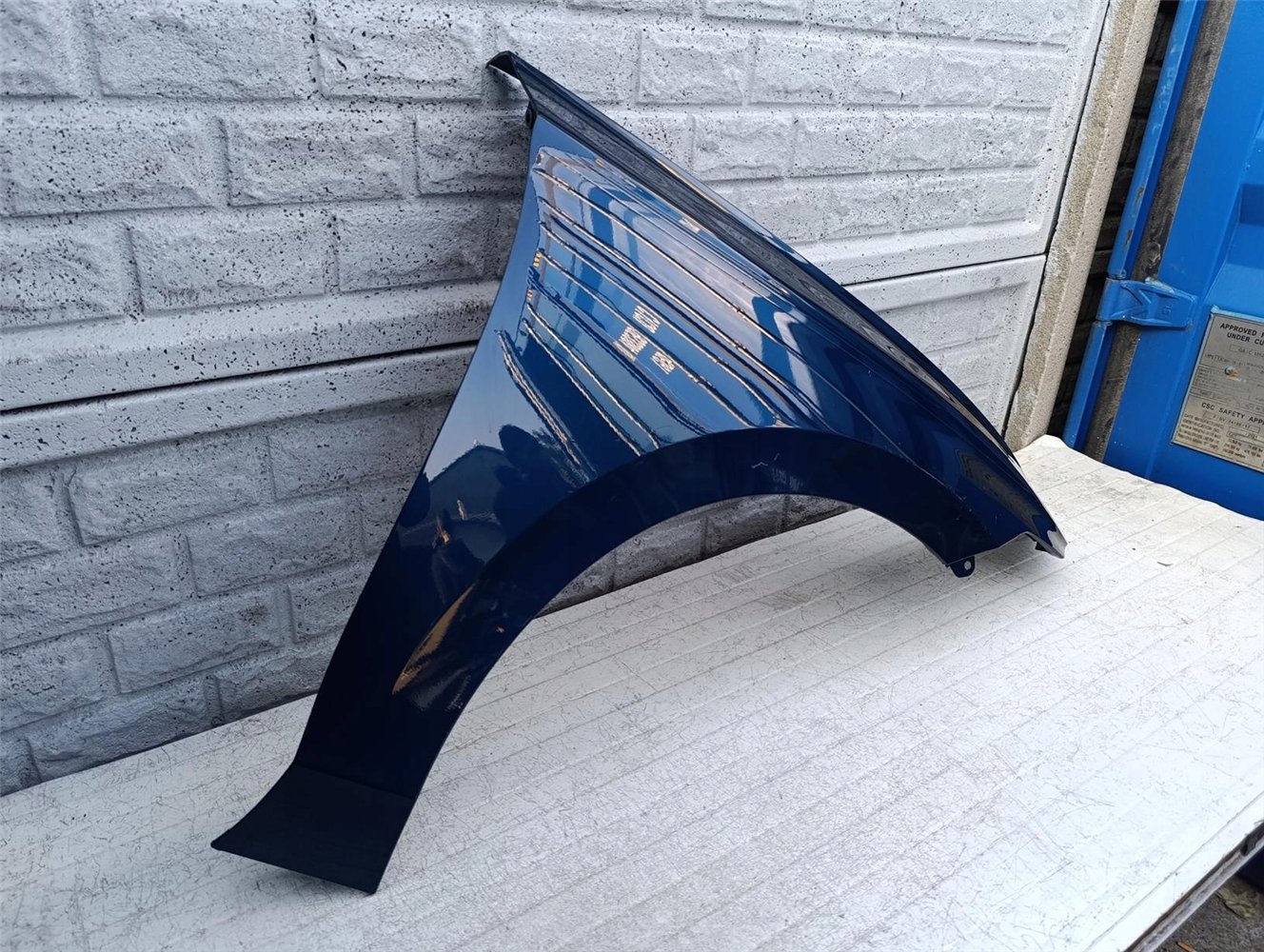 VW ID7 ID 7 BŁOTNIK PRAWY PRZEDNI ORYGINAŁ (17382021337)