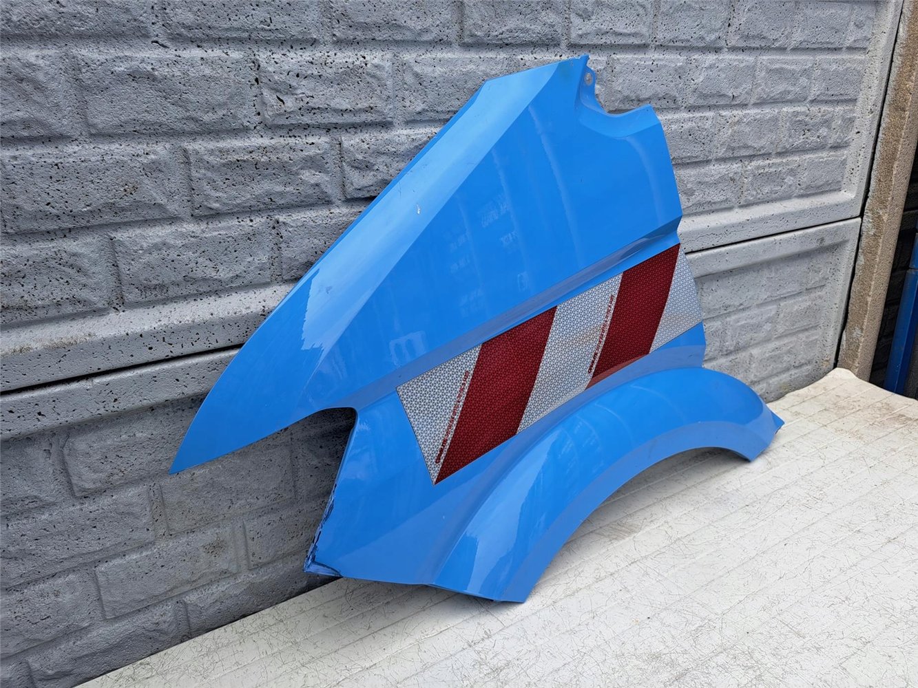 VW CRAFTER MAN TGE 17-24 BŁOTNIK LEWY PRZEDNI ORYGINAŁ (17387314388)