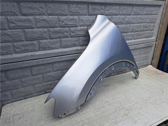 MG HS 18- BŁOTNIK PRZEDNI LEWY ORYGINAŁ (17387319156)