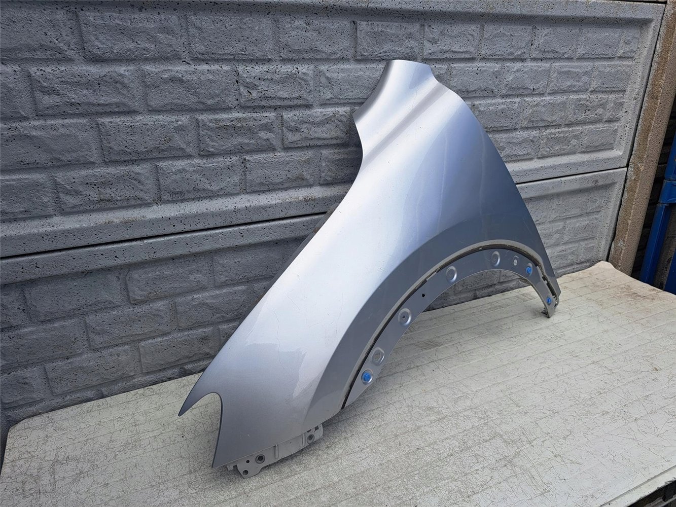 MG HS 18- BŁOTNIK PRZEDNI LEWY ORYGINAŁ (17387319156)