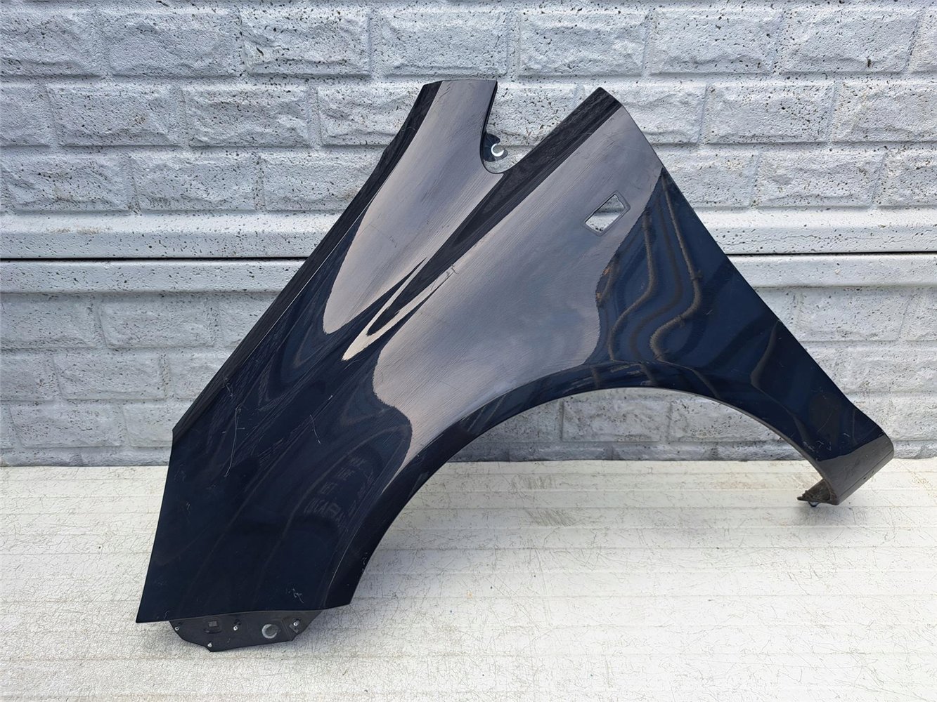 BŁOTNIK LEWY OPEL CORSA D 2006-2015 ORYGINAŁ (17387319820)