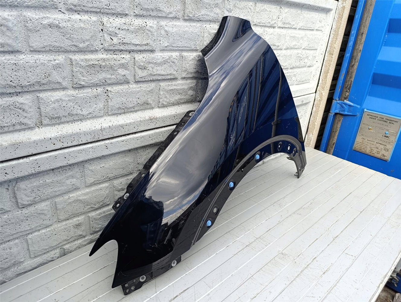 MG HS 18- BŁOTNIK PRZEDNI LEWY ORYGINAŁ (17390352395)