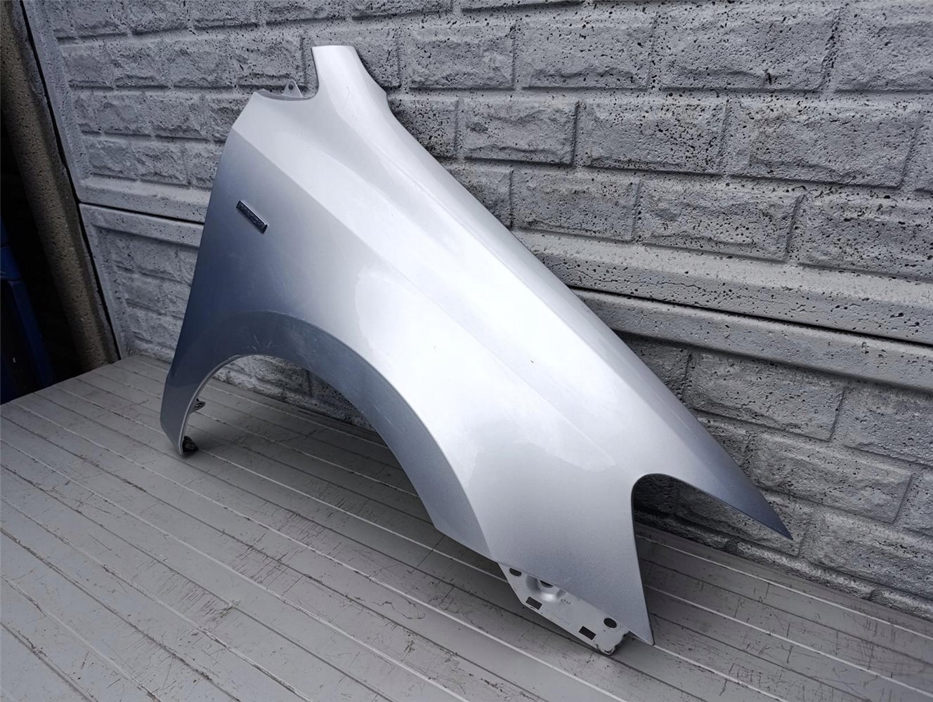 VW POLO V 6R BŁOTNIK PRAWY PRZEDNI ORYGINAŁ (17392710046)