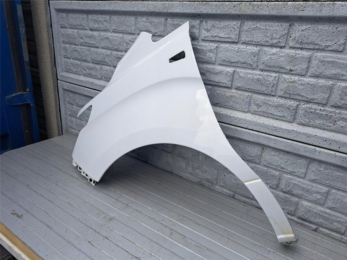 HYUNDAI H1 H-1 18-22 BŁOTNIK PRZEDNI LEWY ORYGINAŁ (17399984028)