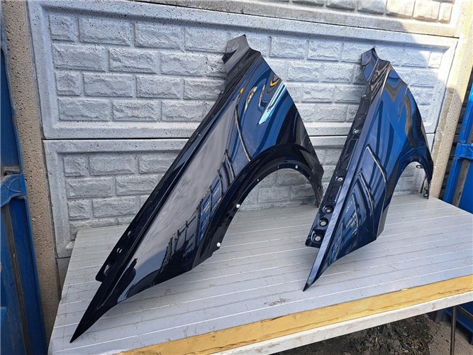 VW TOUAREG III 3 2018 - 2024 BŁOTNIK PRZEDNI LEWY ORYGINAŁ (17400010560)