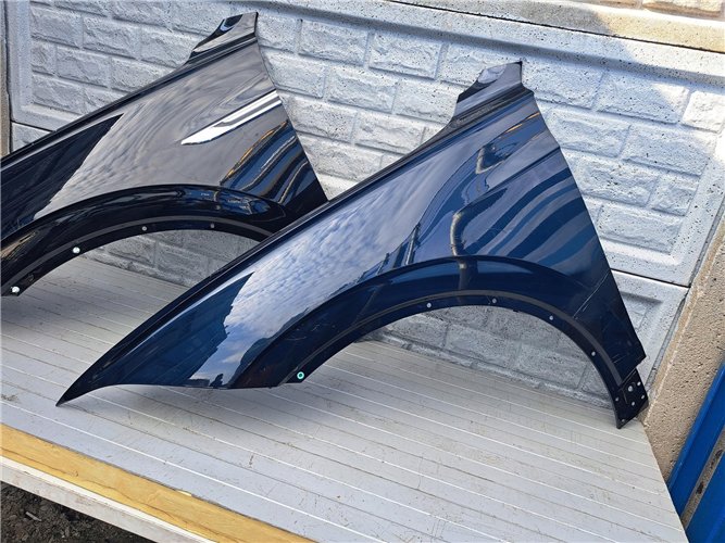 VW TOUAREG III 3 2018 - 2024 BŁOTNIK PRZEDNI LEWY ORYGINAŁ (17400010560)