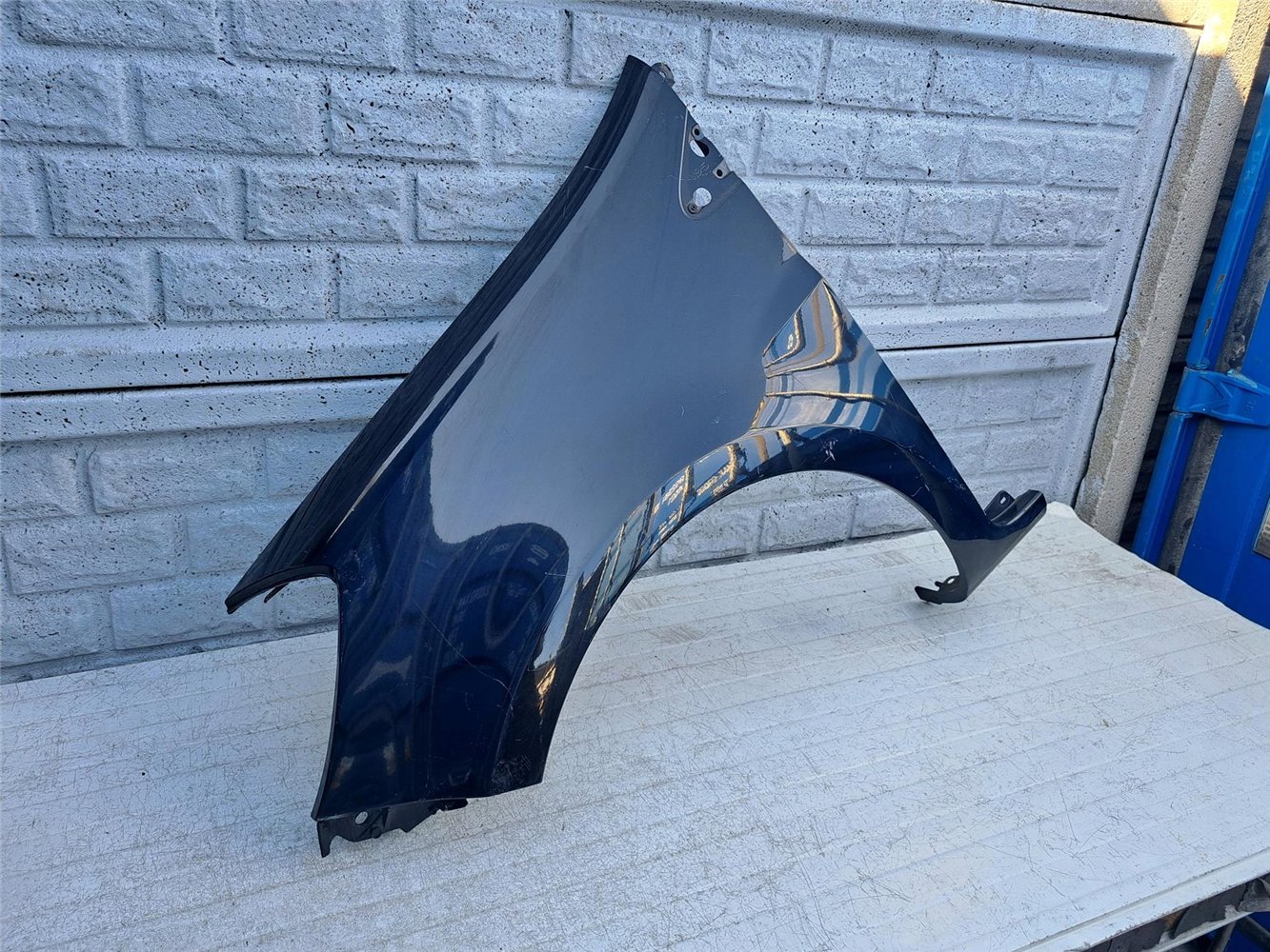 BŁOTNIK PRZEDNI LEWY RENAULT CLIO 3 185 06-13 ORYGINAŁ (17414206468)