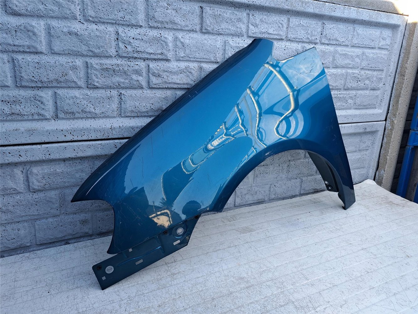 BŁOTNIK PRZEDNI LEWY VW TOURAN 2003 - 2010 ORYGINAŁ (17414211920)