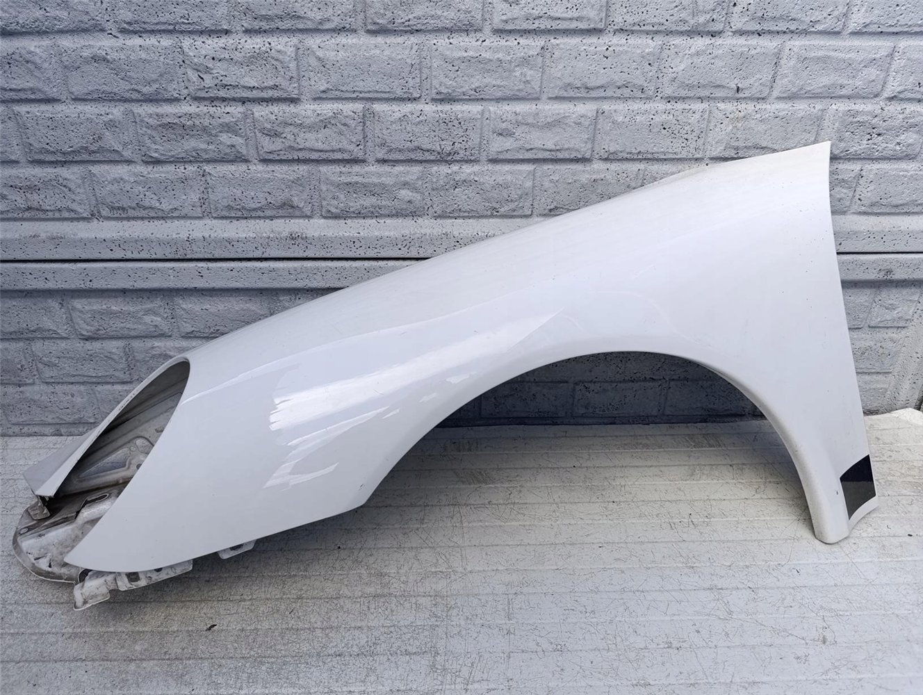 PORSCHE CARRERA 911 997 BŁOTNIK LEWY PRZEDNI ORYGINAŁ (17417829101)