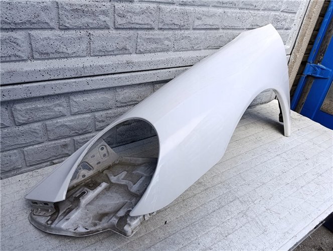 PORSCHE CARRERA 911 997 BŁOTNIK LEWY PRZEDNI ORYGINAŁ (17417829101)