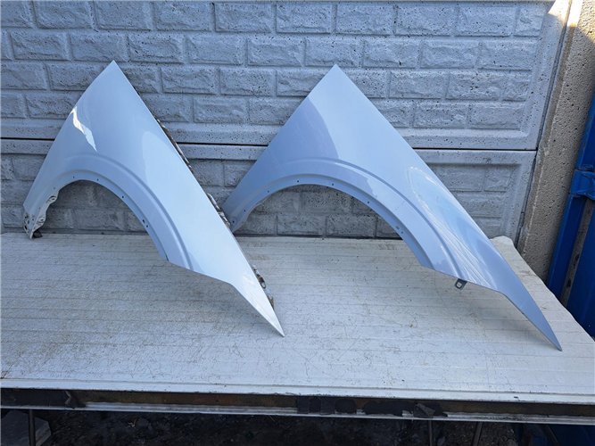 POLESTAR 2 BŁOTNIK PRZEDNI PRAWY ORYGINAŁ (17421229287)