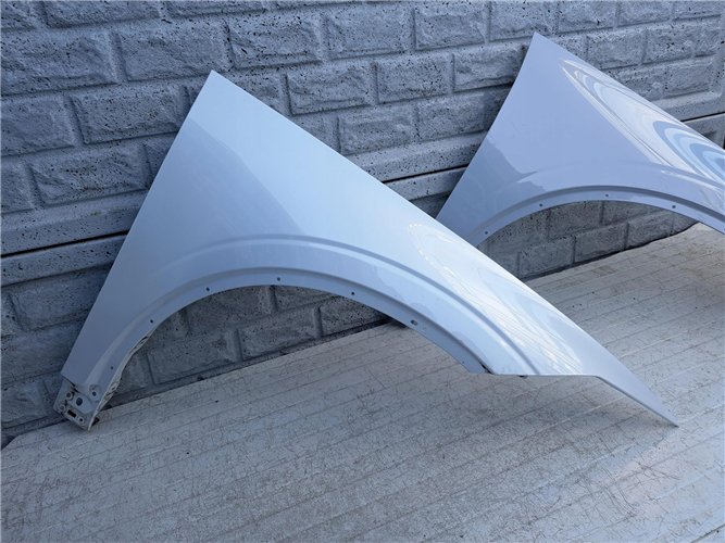 POLESTAR 2 BŁOTNIK PRZEDNI PRAWY ORYGINAŁ (17421229287)