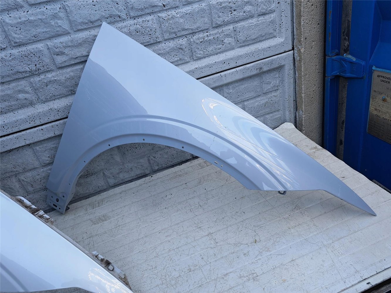 POLESTAR 2 BŁOTNIK PRZEDNI PRAWY ORYGINAŁ (17421229287)