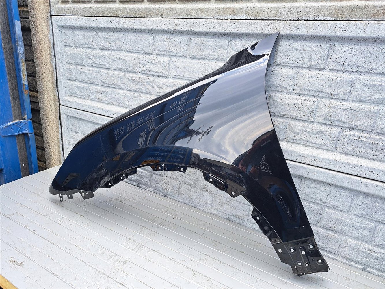 PORSCHE CAYENNE LIFT 7P5 15- BŁOTNIK LEWY ORYGINAŁ (17434425174)